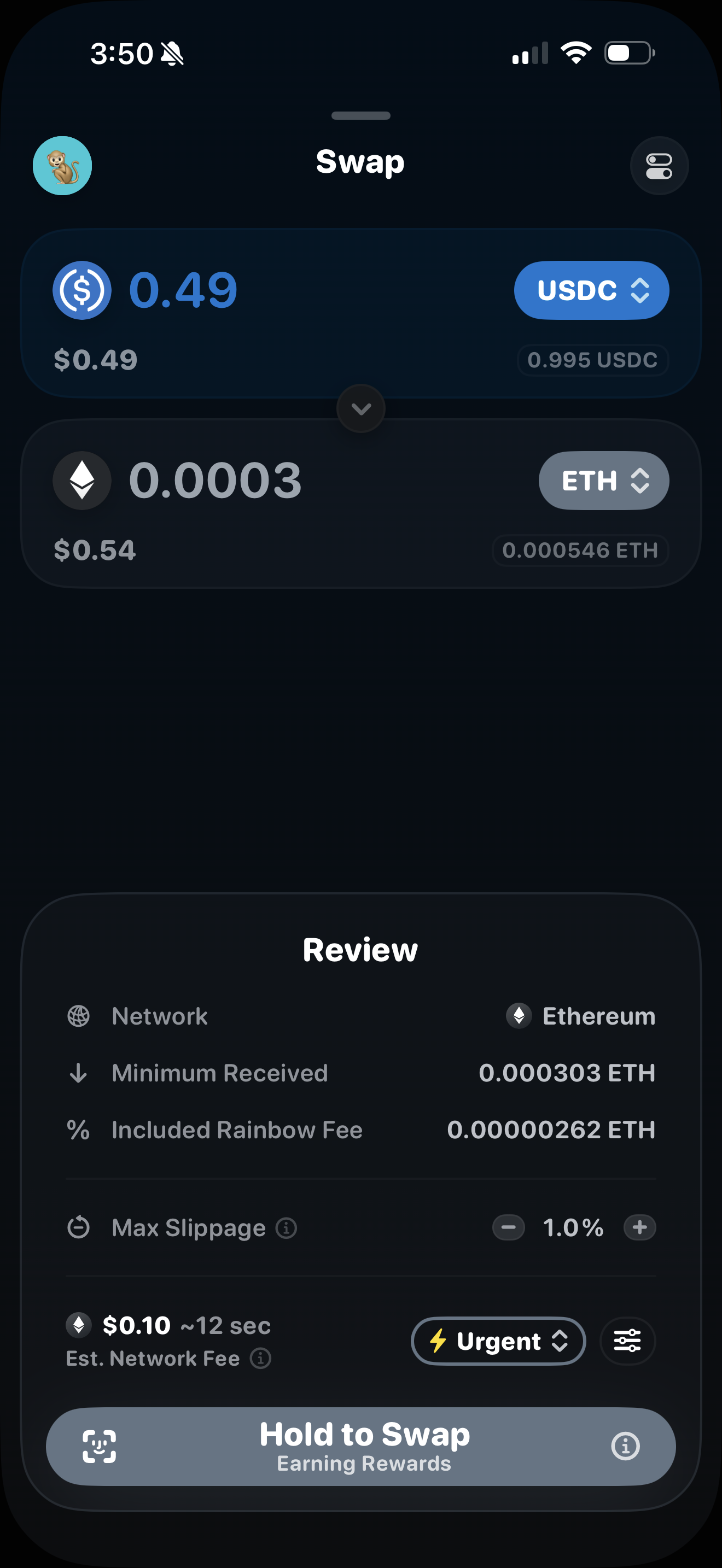 Rainbow iOS built-in swap Review panel itemizing the "Included Rainbow Fee" (in ETH) alongside network fee, minimum received, and max slippage